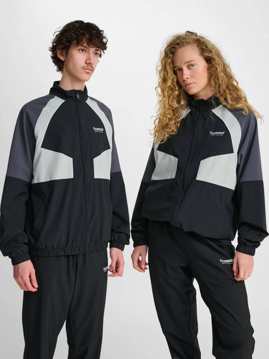 hmlLOOSE TRACK ZIPJACKET SPORTSWEAR