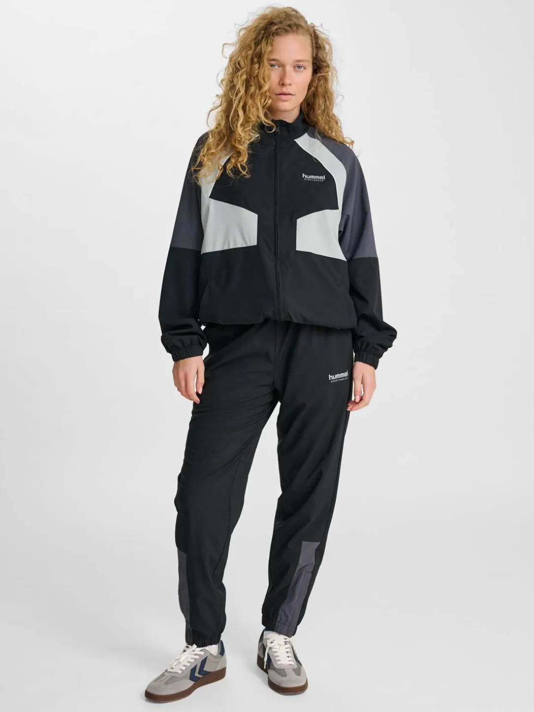 hmlLOOSE TRACK ZIPJACKET SPORTSWEAR