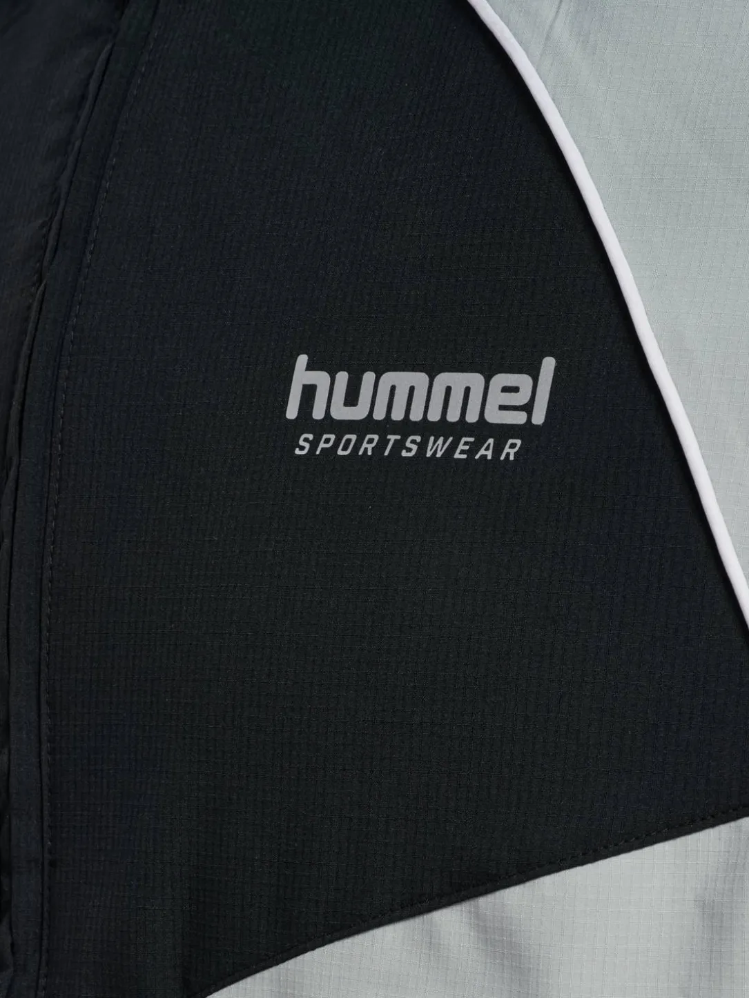 hmlLOOSE TRACK ZIPJACKET SPORTSWEAR
