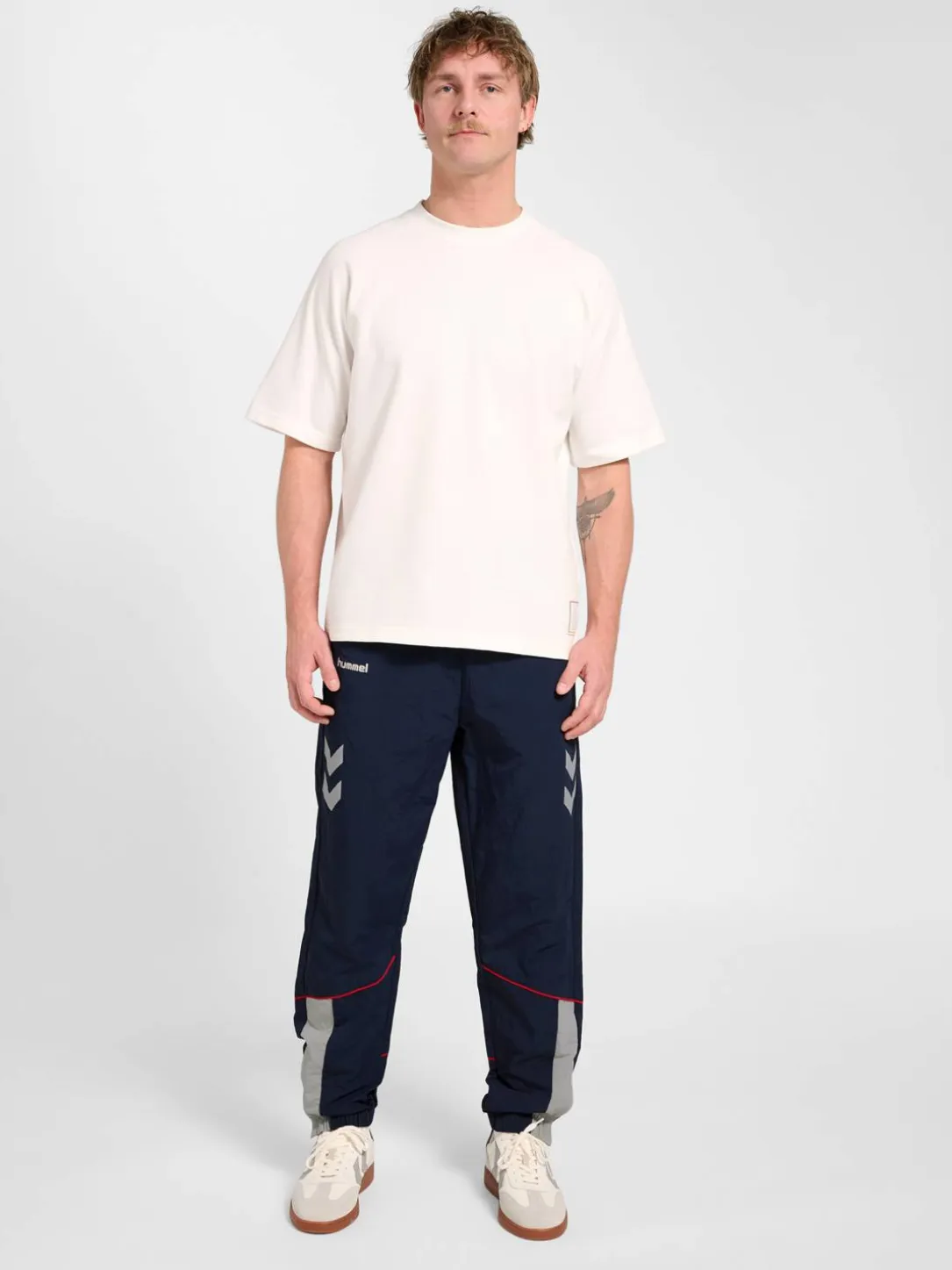 hmlWORLD 26 TRACK PANTS