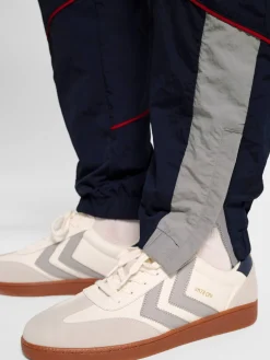 hmlWORLD 26 TRACK PANTS
